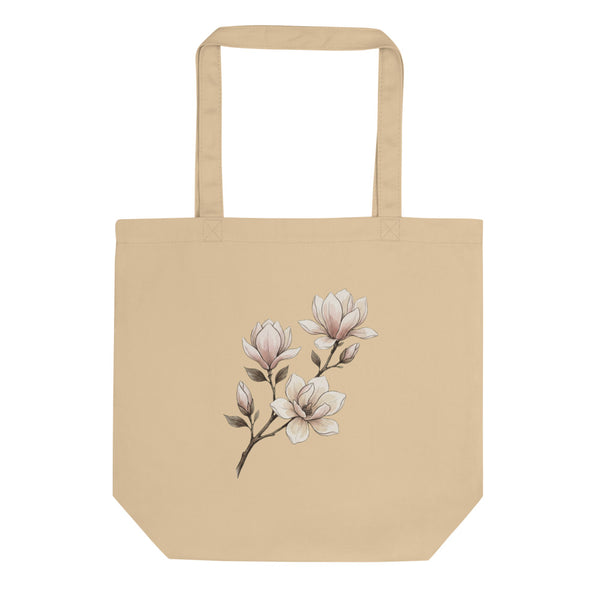 Tote bag botanique minimaliste femme, face avant : illustration branche de magnolia en encre fine et lavis aquarelle rose poudré, impression DTG sur toile de coton 38×42 cm